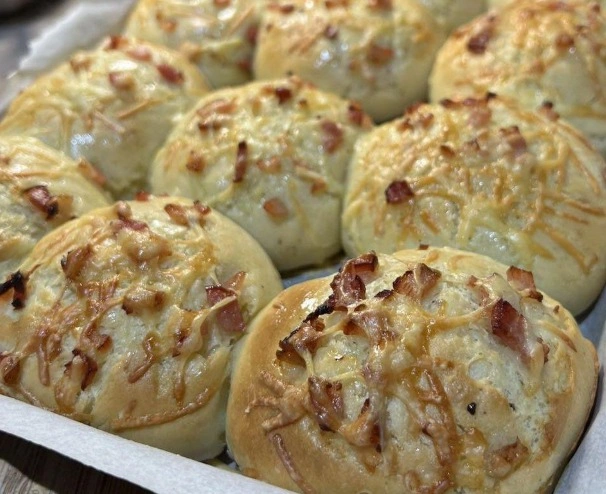 Fresh homemade Neiman Marcus Rolls filled with bacon, cheddar cheese, and chives